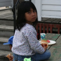 Child with food from St. Bridget's Catholic Church