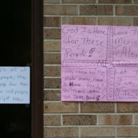 Handwritten signs outside St. Bridget's Catholic Church 01