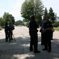 TV reporters and police