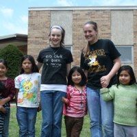Volunteers with children at St. Bridget's Catholic Church 02