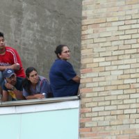 Watching march from rooftop 01