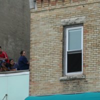 Watching march from rooftop 02